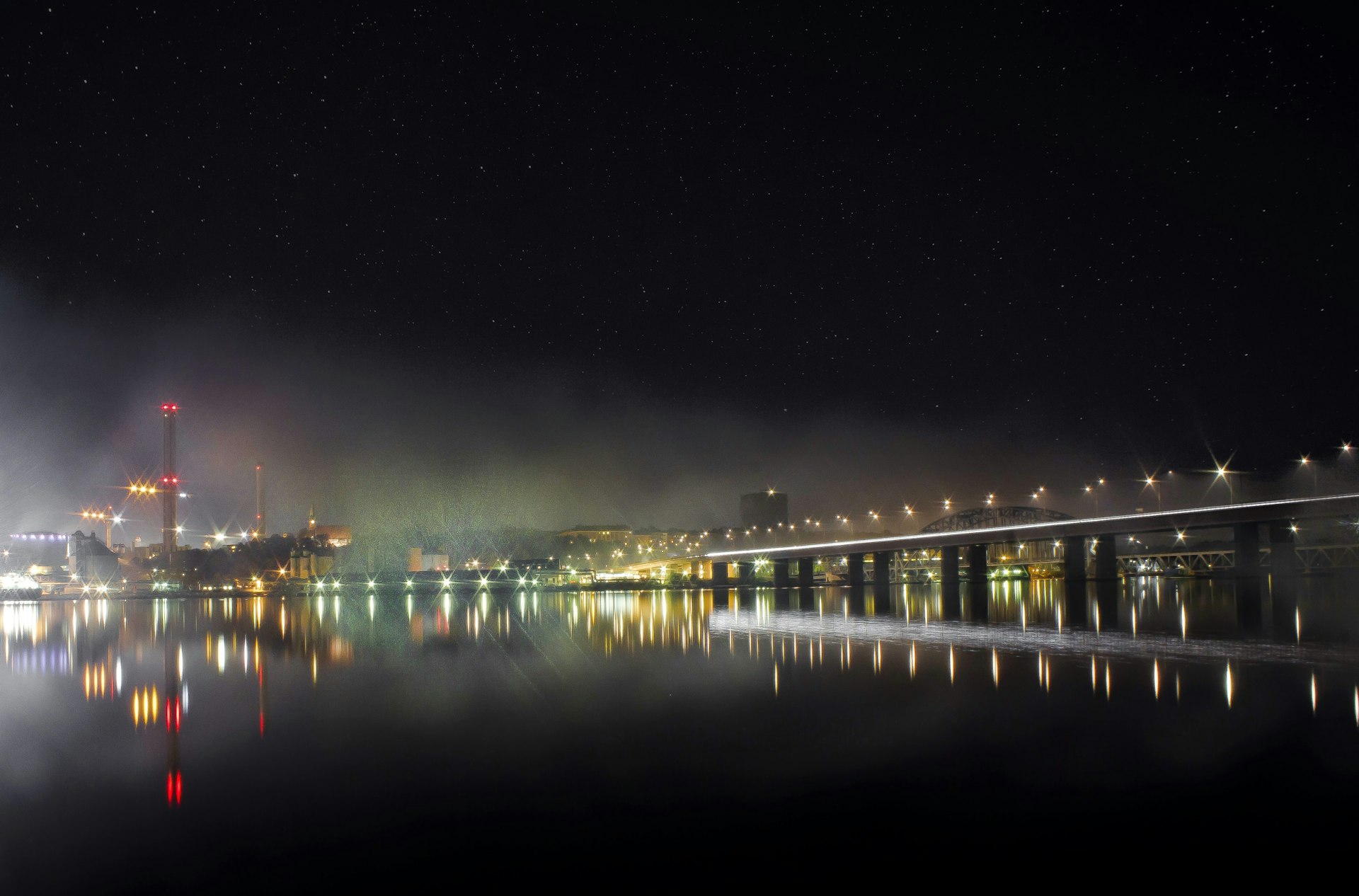 bridge over water during night time